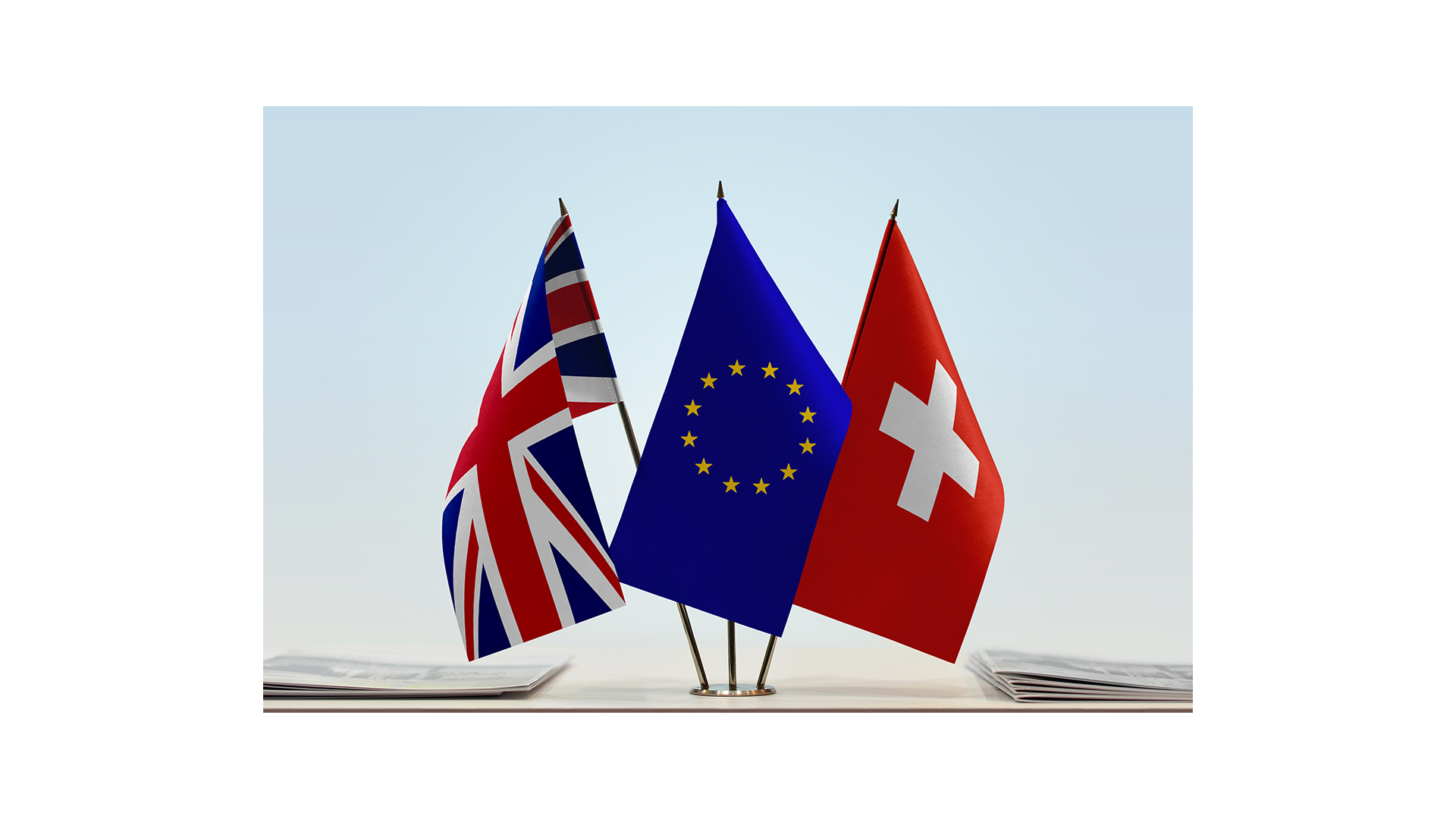 picture of EU, UK, and Switzerland flags